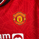 Camisa Manchester United I 23/24 - Torcedor Adidas Feminina - Vermelha com detalhes em preto e branco