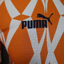 Camisa Seleção Costa do Marfim Pré-Jogo 23/24 - Jogador Puma Masculina - Laranja com detalhes em branco e verde