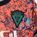 Kit Infantil Cadiz Edição Especial Macron 23/24 - Laranja com detalhes em azul e branco