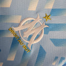 Camisa Olympique Marseille Treino 23/24 - Torcedor Puma Masculina - Azul com detalhes em branco e dourado