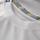 Camisa Leeds I 25/26 - Torcedor Adidas Feminina - Branca com detalhes em azul e amarelo