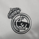 Camisa Real Madrid Polo 23/24 - Torcedor Adidas Masculina - Branca com detalhes em preto