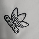 Camisa Real Madrid Polo 23/24 - Torcedor Adidas Masculina - Branca com detalhes em preto