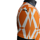 Camisa Seleção Costa do Marfim Pré-Jogo 23/24 - Jogador Puma Masculina - Laranja com detalhes em branco e verde