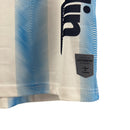 Camisa Málaga I 23/24 - Torcedor Hummel Masculina - Branca com detalhes em azul