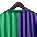 Camisa Málaga II 23/24 - Torcedor Hummel Masculina - Verde e roxo com detalhes em azul
