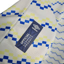 Camisa El Salvador 23/24 - Torcedor Umbro Masculina - Branca com detalhes em azul e amarelo