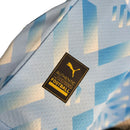 Camisa Olympique Marseille Treino 23/24 - Torcedor Puma Masculina - Azul com detalhes em branco e dourado