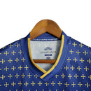 Camisa Cagliari Edição Especial 23/24 - Torcedor Eye Masculina - Azul com detalhes em amarelo e vermelho