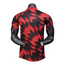 Camisa Manchester United Pré-jogo 25/26 - Jogador Adidas Masculina - Vermelha com detalhes em preto
